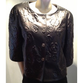 CHANEL jacket in black leather embossed camellias