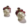 Marguerite de Valois clip-on earrings in gold plated metal and red and pink molten glass