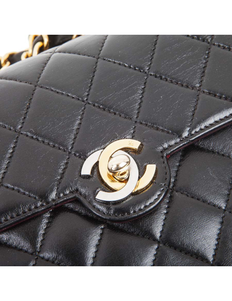 Mini sac CHANEL cuir d'agneau lisse matelassé noir
