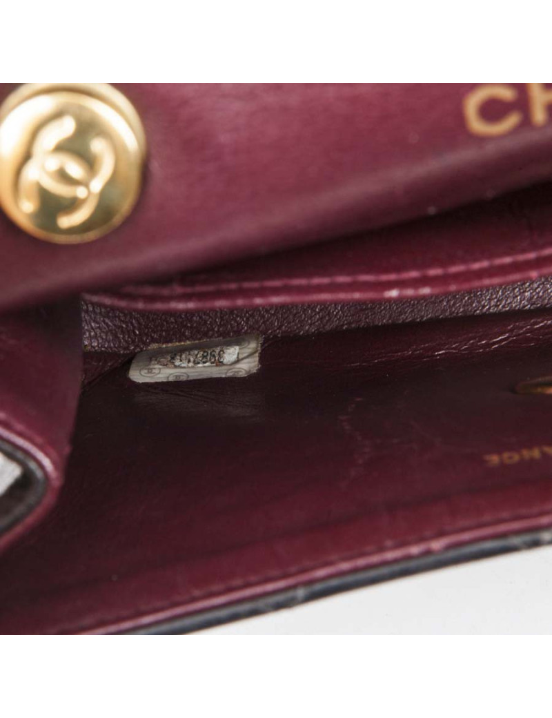 Mini sac CHANEL cuir d'agneau lisse matelassé noir