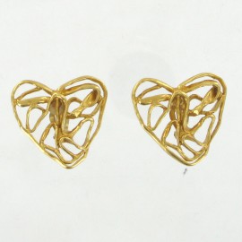Clips d'oreilles vintage YVES SAINT LAURENT en métal doré à l'or fin
