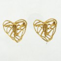 Clips d'oreilles vintage YVES SAINT LAURENT en métal doré à l'or fin