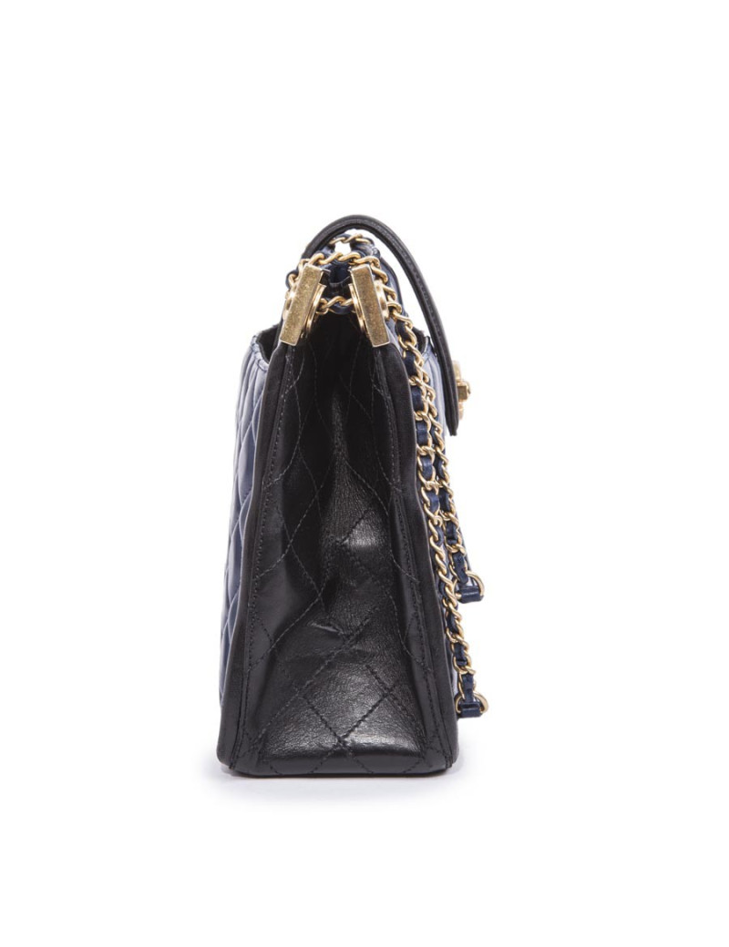 CHANEL Bag in blue quilted leather and black finishes