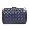 CHANEL Bag in blue quilted leather and black finishes