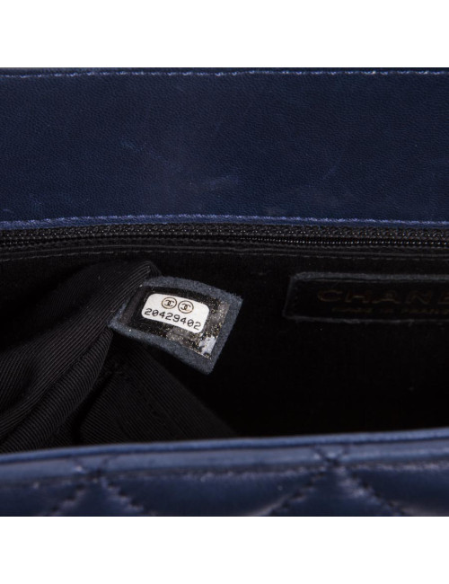 CHANEL Bag in blue quilted leather and black finishes