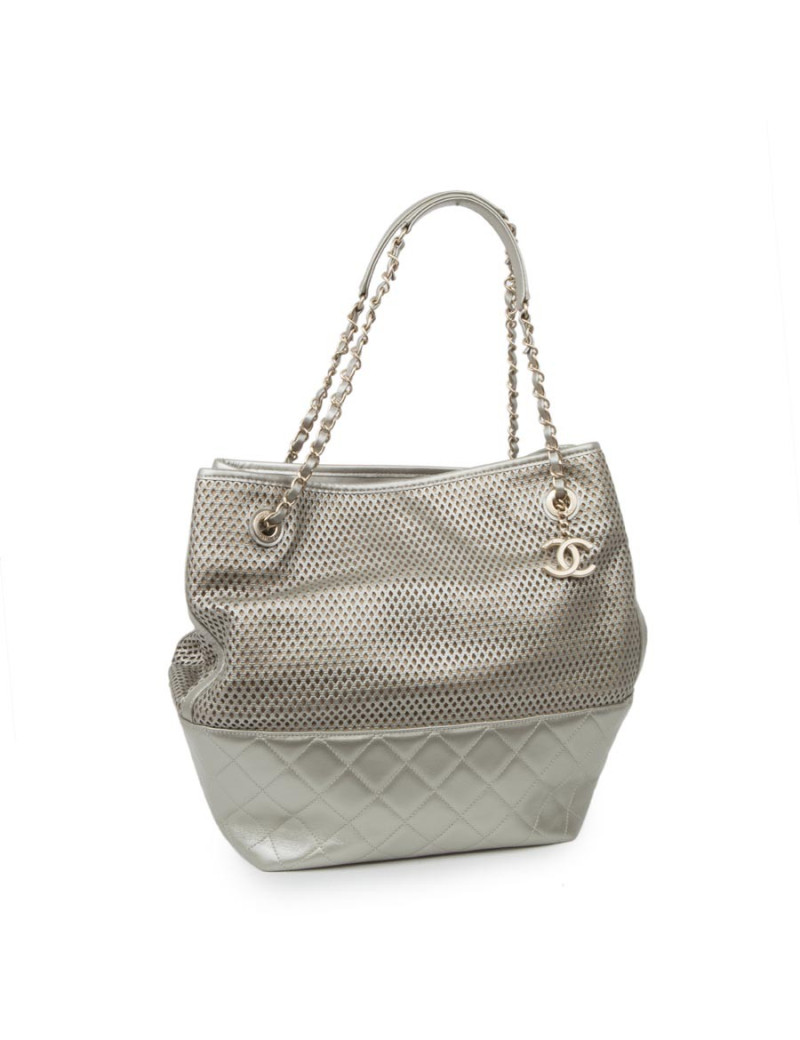 CHANEL quilted and perforated leather bag