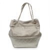 CHANEL quilted and perforated leather bag