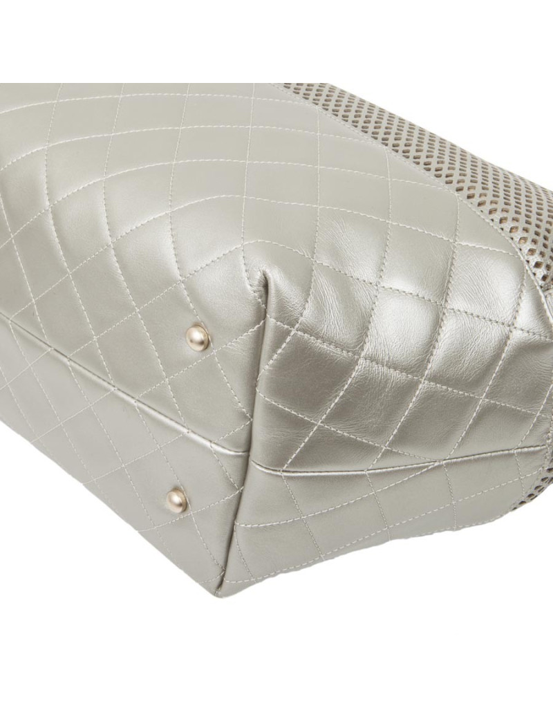 CHANEL quilted and perforated leather bag