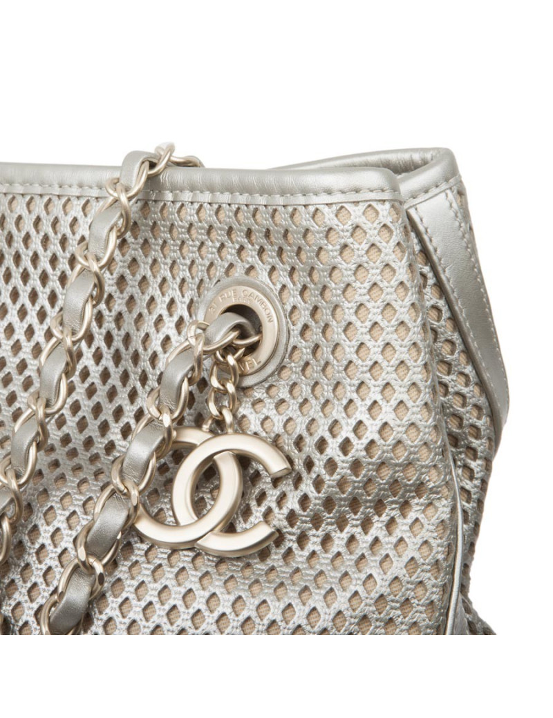 CHANEL quilted and perforated leather bag