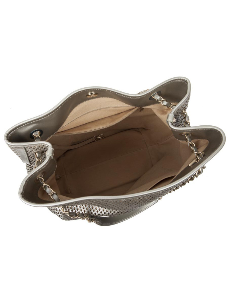 CHANEL quilted and perforated leather bag