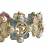 Bracelet CHANEL en métal doré, résine de couleur, perles nacrées et strass