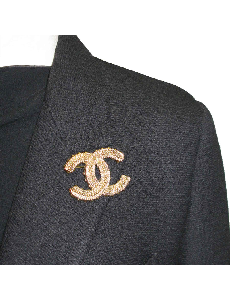 Broche CHANEL CC en métal doré vieilli