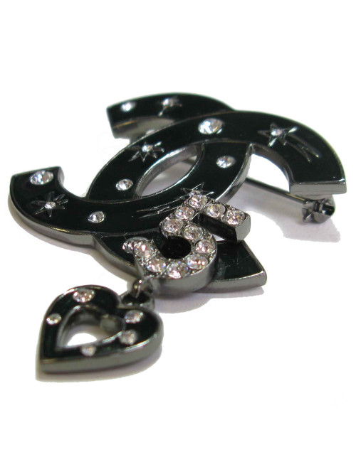 CHANEL CC Brooch in silver plated metal and black enamel