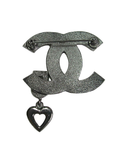 CHANEL CC Brooch in silver plated metal and black enamel