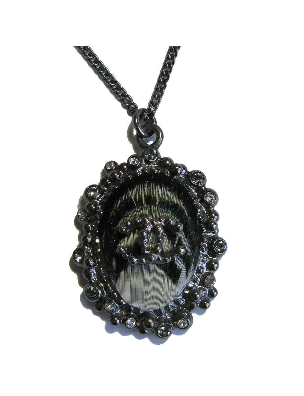 Collier CHANEL en métal argenté et plume