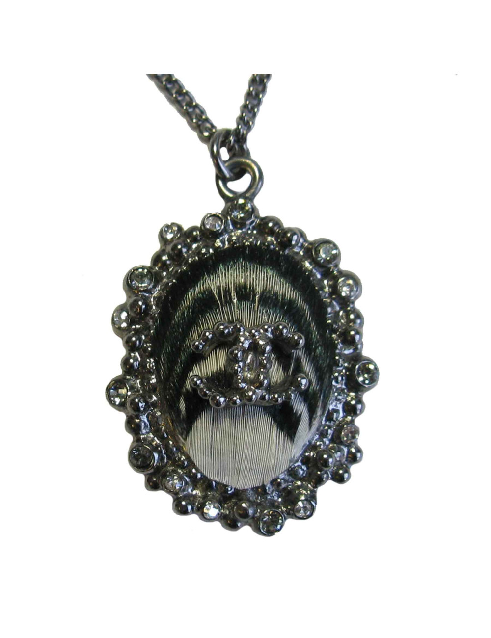 CHANEL pendant necklace in silver plated metal and feather