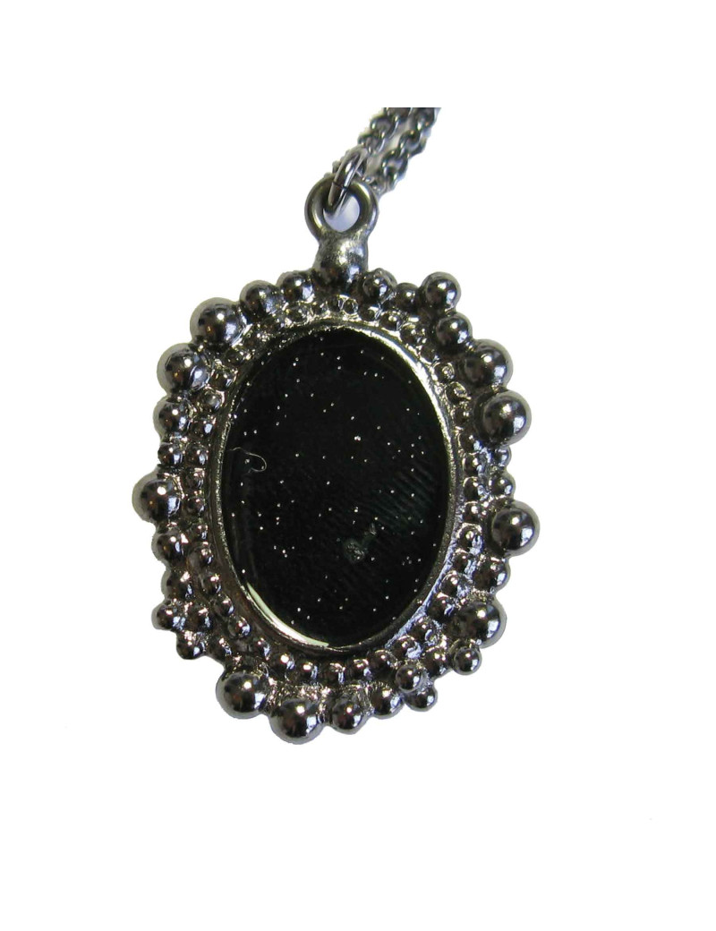 Collier CHANEL en métal argenté et plume