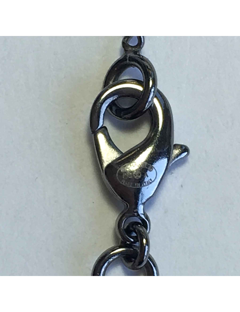 CHANEL pendant necklace in silver plated metal and feather