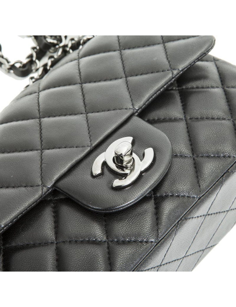 Mini sac CHANEL  cuir d'agneau lisse matelassé noir