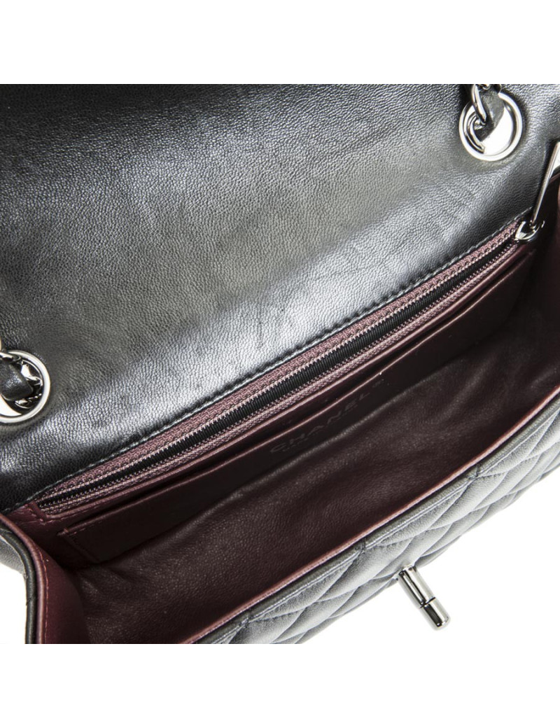 Mini sac CHANEL  cuir d'agneau lisse matelassé noir