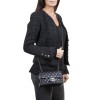 CHANEL mini 'Timeless' flap bag in quilted black smooth lamb leather
