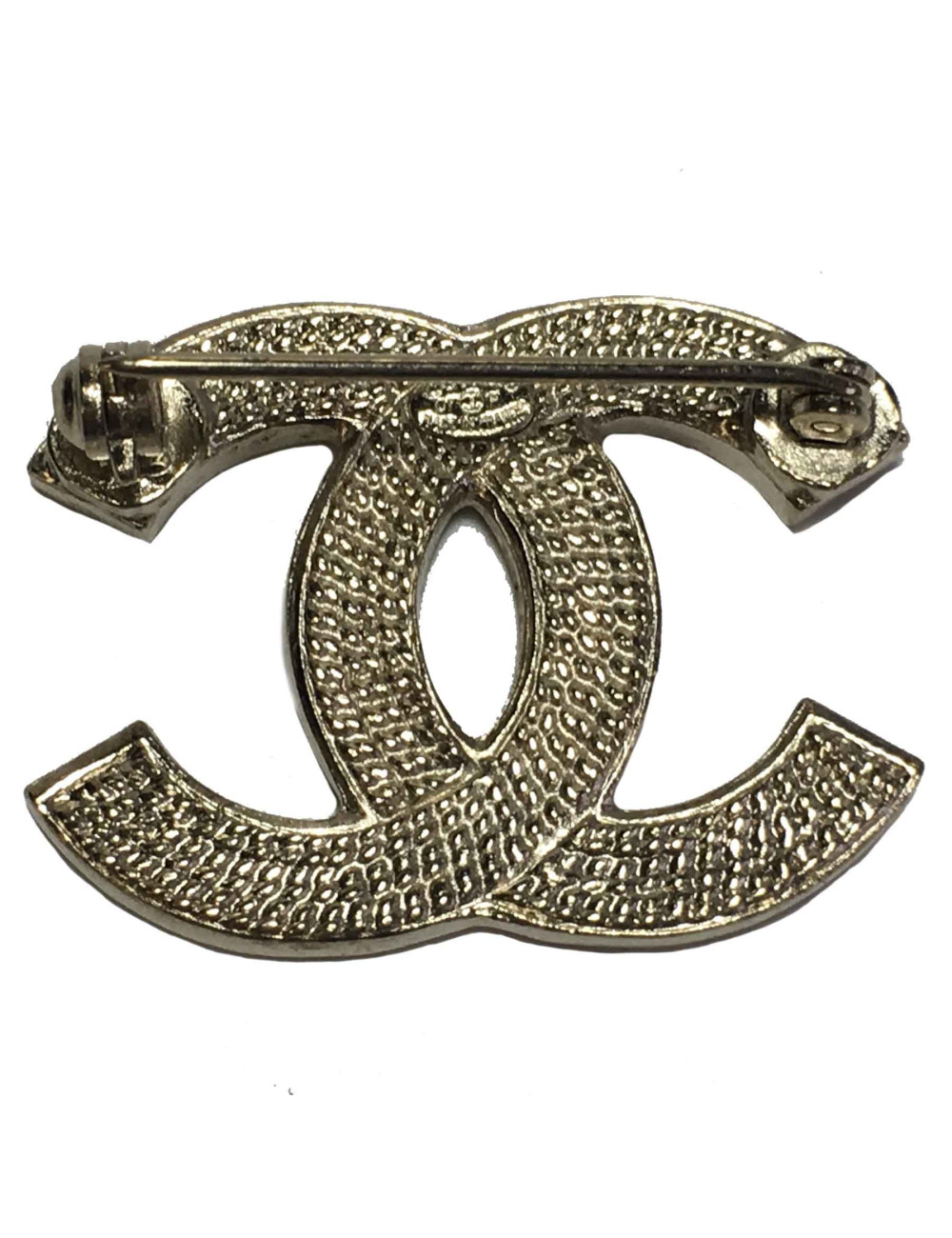Broche CC CHANEL en métal doré
