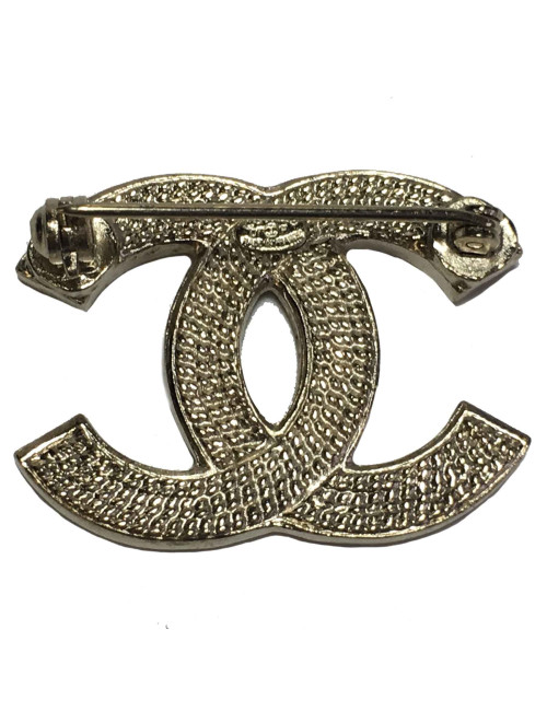 Broche CC CHANEL en métal doré