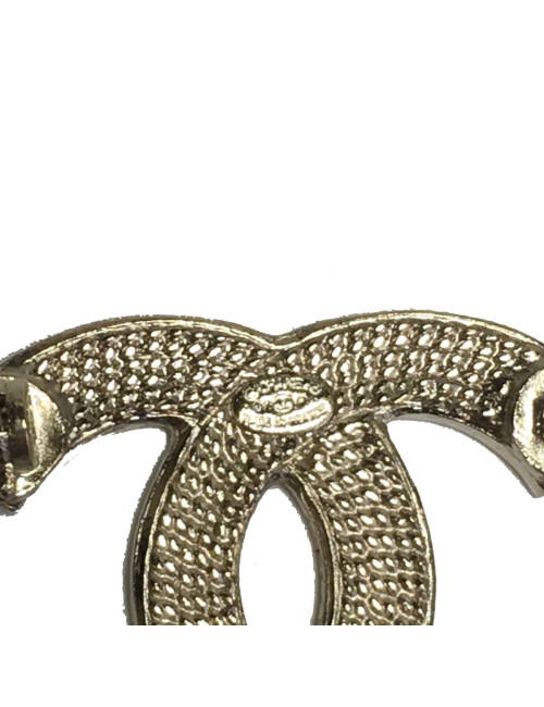 Broche CC CHANEL en métal doré