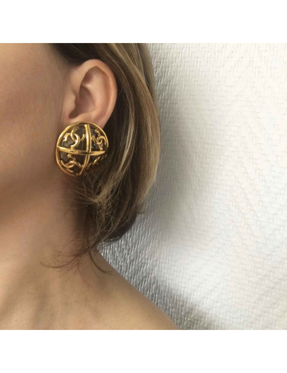 Boucles d'oreille clips CHANEL Vintage en métal doré