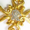 CHRISTIAN LACROIX Vintage brooch in gilt metal and rhinestones