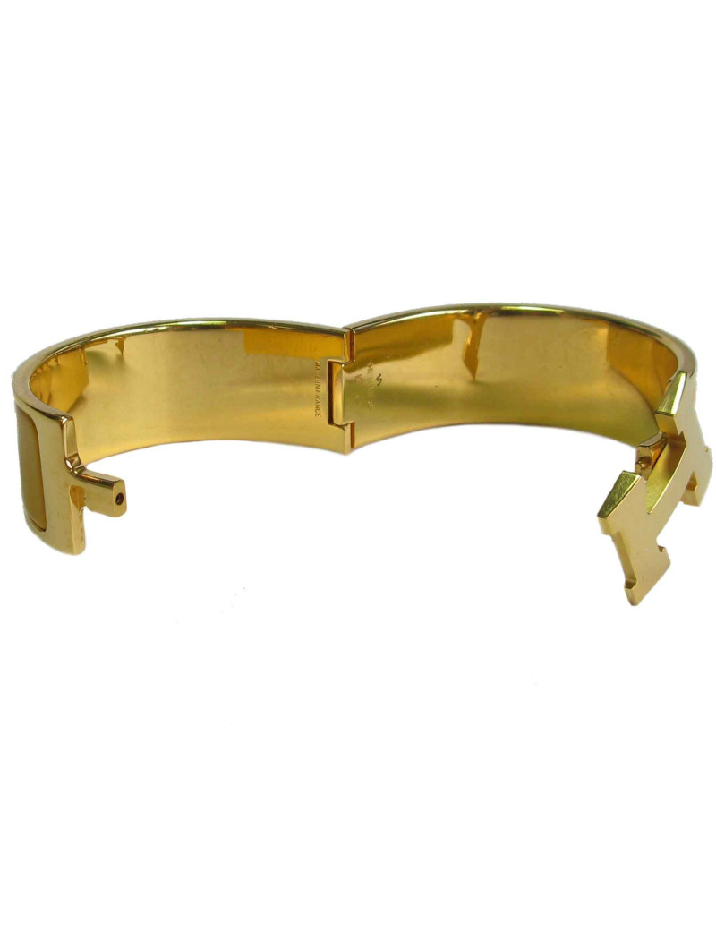 Bracelet Clic Clac HERMES en émail jaune, plaqué or