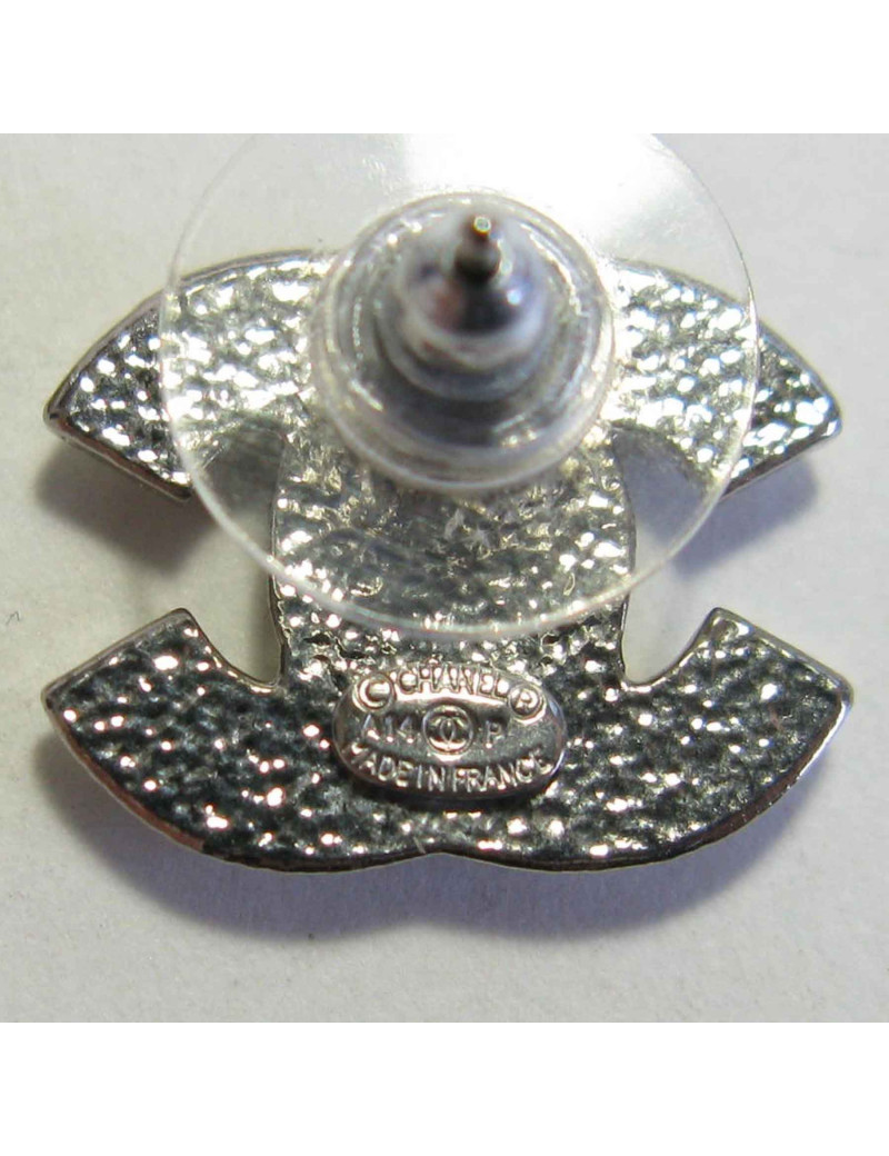 Boucles d'oreille clous CHANEL CC strass et métal argenté