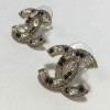 CHANEL CC stud earrings in gilded metal and bicolor rhinestones