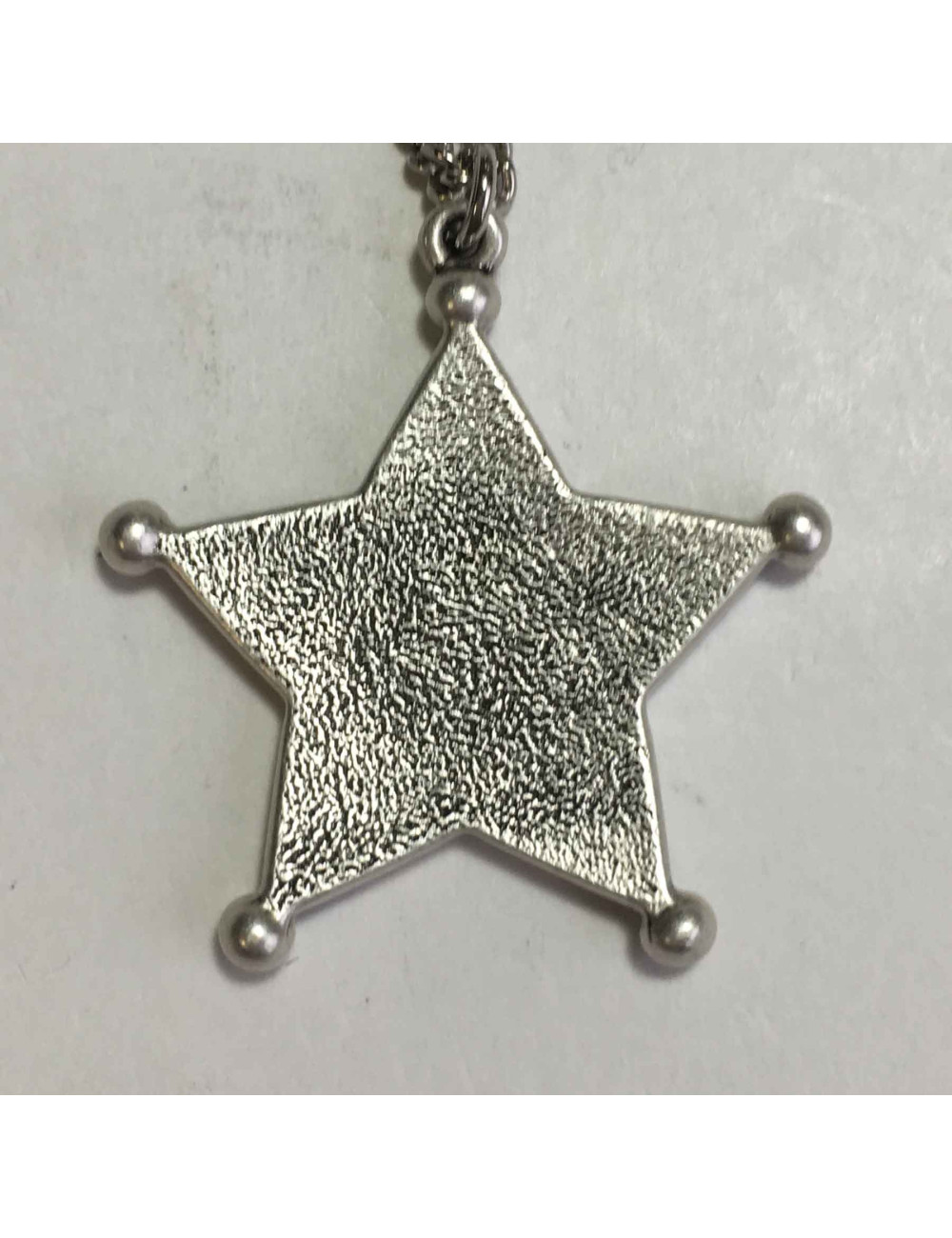 Collier CHANEL pendentif collection Paris Dallas en métal argenté