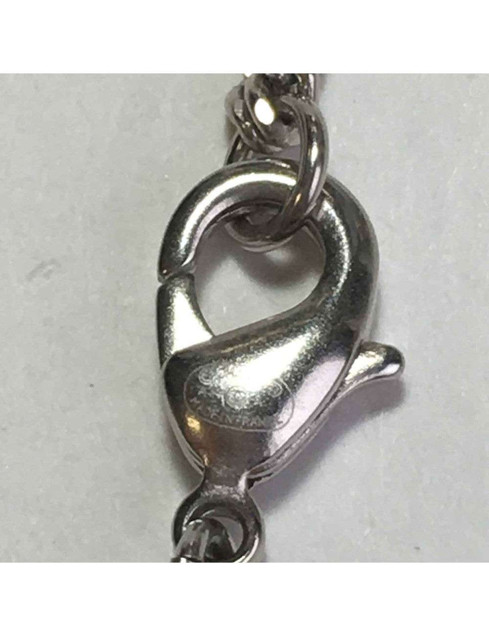 Collier CHANEL pendentif collection Paris Dallas en métal argenté