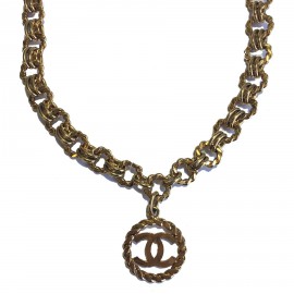 Sautoir CHANEL Vintage chaîne et pendentif rond en métal doré