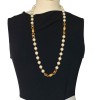 Vintage CHANEL Necklace in molten glass pearls and gilded metal charms
