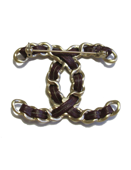 Broche CHANEL CC chaine dorée et cuir bordeaux