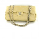 CHANEL leather bag soft beige color with embroidered rhombuses