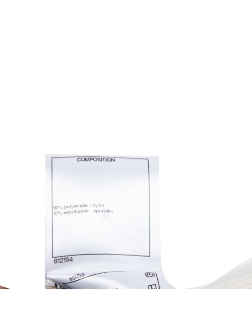 Blouse CHANEL sans manches avec perles blanches