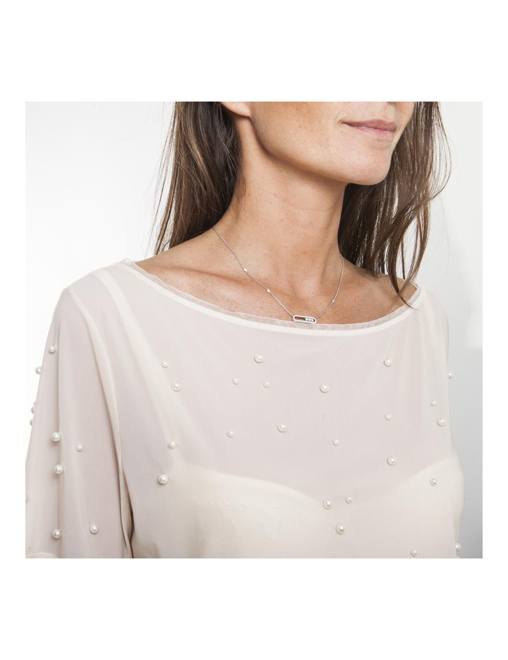 Blouse CHANEL sans manches avec perles blanches