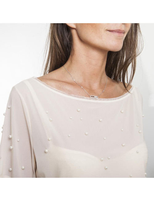 Blouse CHANEL sans manches avec perles blanches