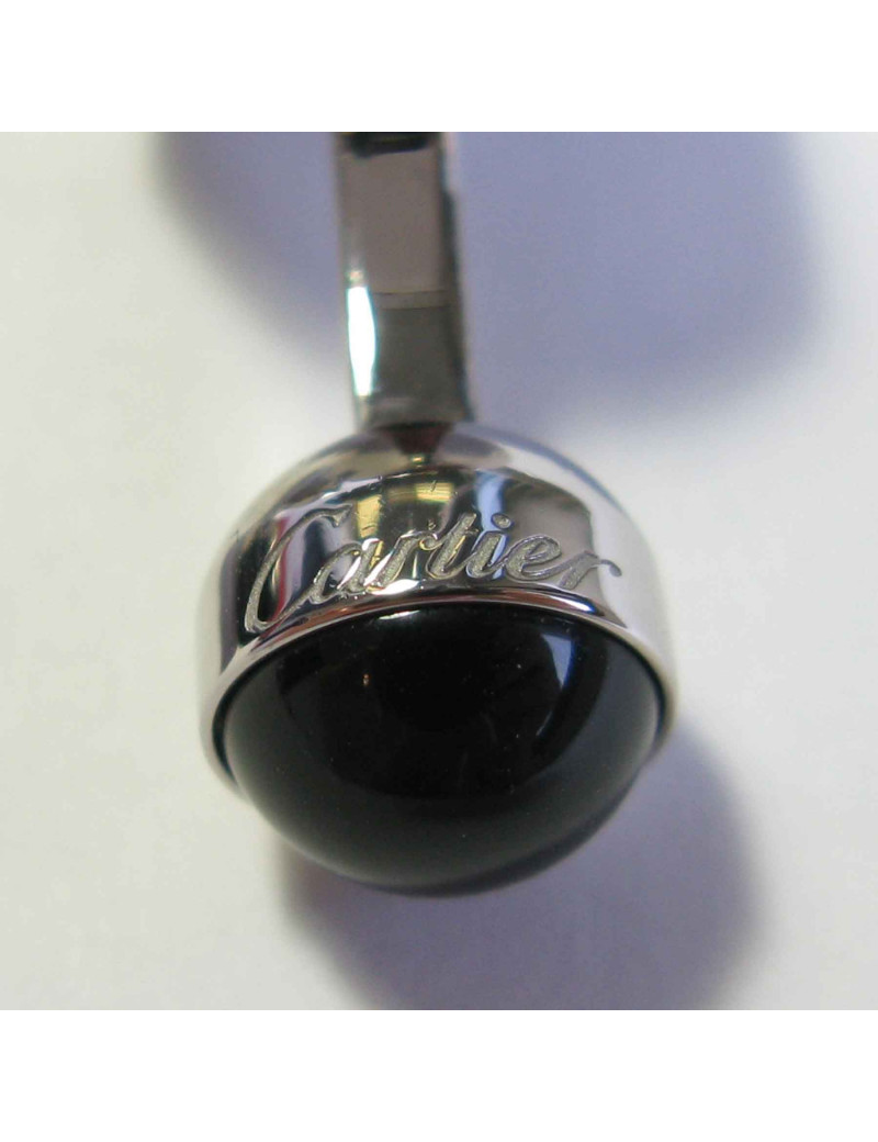 Boutons de manchette CARTIER 'tête d'ours' en argent massif