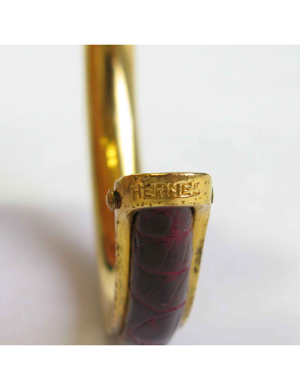 HERMES vintage bracelet in gold plated metal and Red H crocodile leather