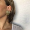 Boucles d'oreilles clips YVES SAINT LAURENT en métal doré
