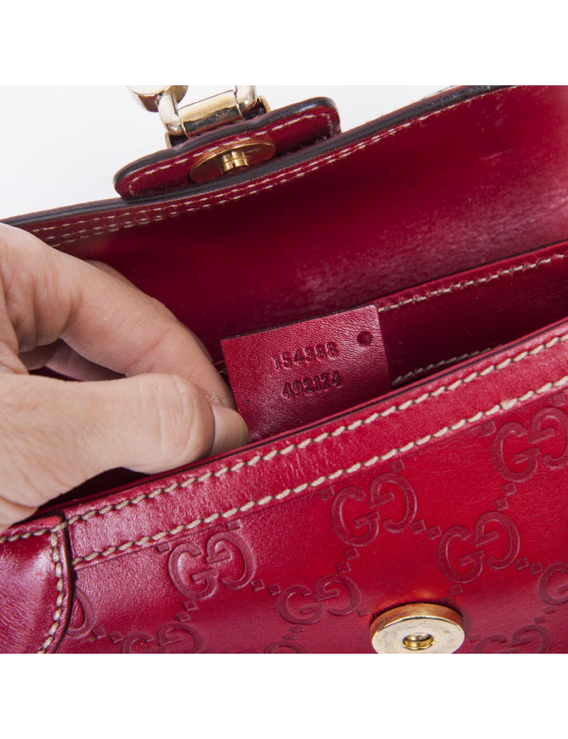 Petit sac GUCCI cuir embosé "GG" rouge