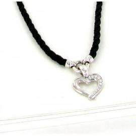 RAS's neck and JOLY-POTTUZ black-heart in white gold set with diamonds