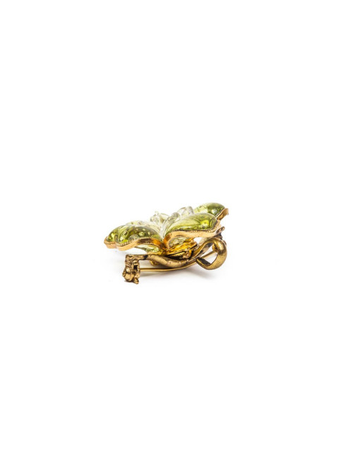 CHANEL camélia brooch in gilded metal and green molten glass