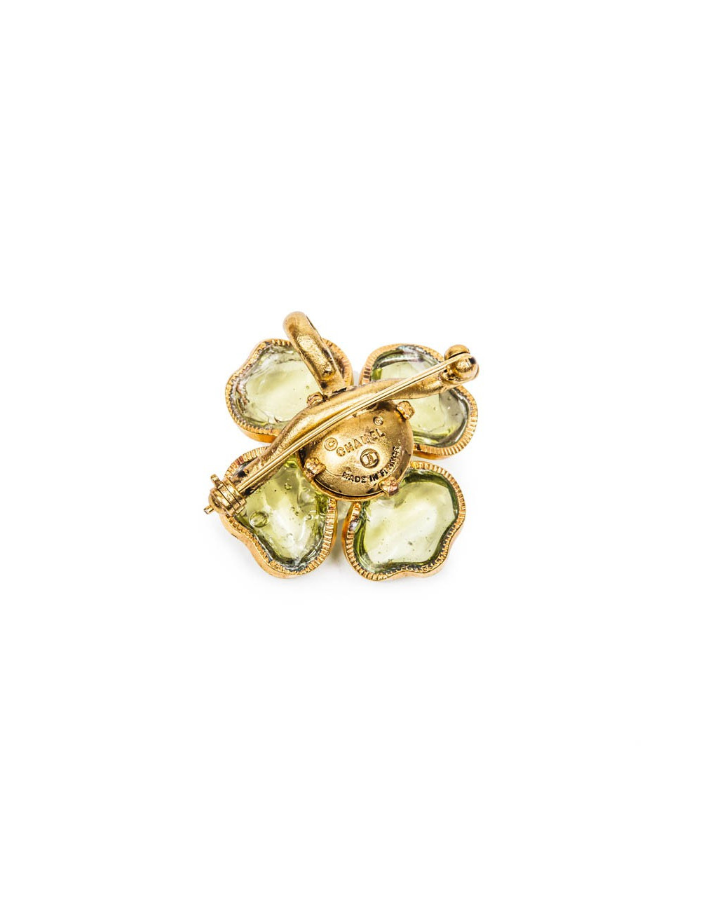 CHANEL camélia brooch in gilded metal and green molten glass
