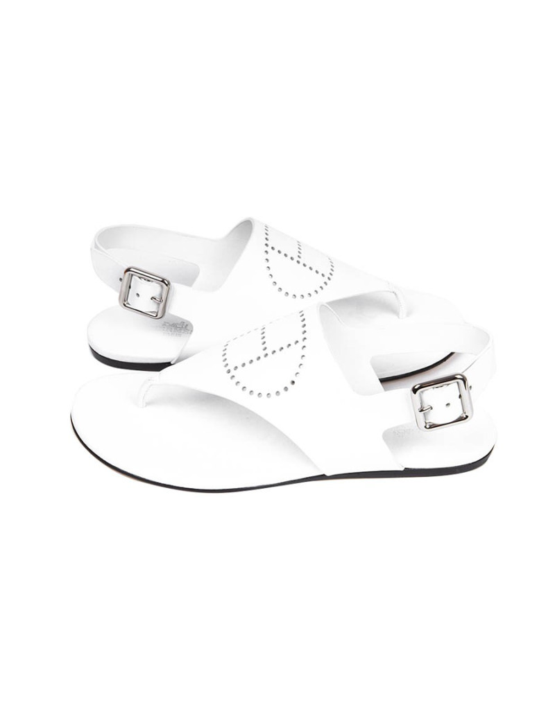 Sandales HERMES plate en cuir blanc H perforé